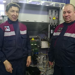 Grade 5 electricians Gennady Ibakaev and Nail Sharipov work in the surface equipment repair section.